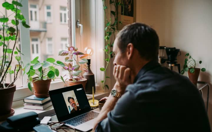 Man on a laptop taking a video call